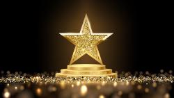 A gold star on golden. Symbolising an award